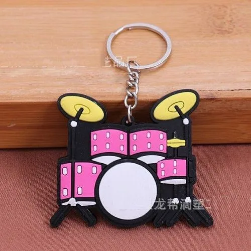 Брелок резиновый Ударная установка. Цвет розовый.